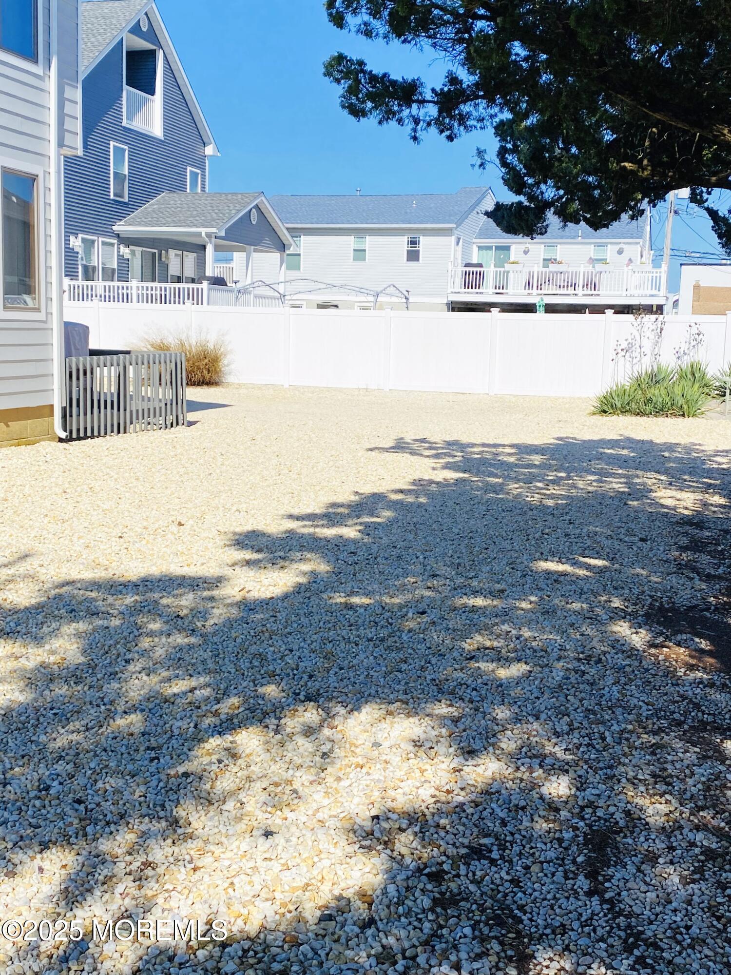 104 5th Avenue, Unit UP Seaside Heights, NJ 08751 - Photo 17 of 17 a view of ocean with large trees