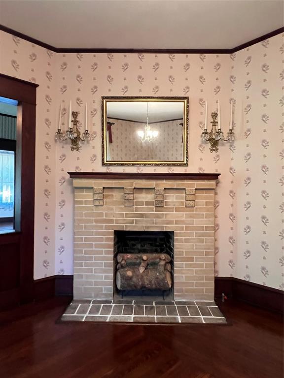 505 North Elm Street Comanche, TX 76442 - Photo 7 of 40 a living room with a fireplace