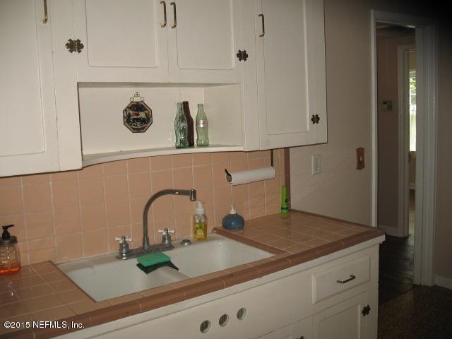 4834 Dundee Road Jacksonville, FL 32210 - Photo 11 of 28 a close view of sink and tap