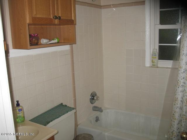 4834 Dundee Road Jacksonville, FL 32210 - Photo 18 of 28 a bathroom with a shower
