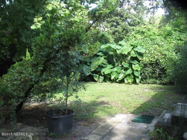 4834 Dundee Road Jacksonville, FL 32210 - Photo 23 of 28 a view of a flower in a yard
