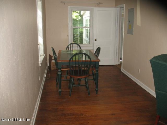 4834 Dundee Road Jacksonville, FL 32210 - Photo 8 of 28 a view of a dining room with furniture and window