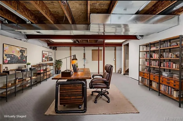 a room with furniture and gym equipment