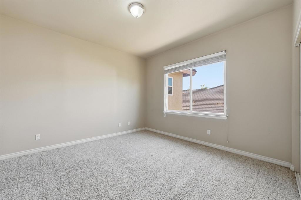 2612 Coyote Ridge Terrace Chula Vista, CA 91915 - Photo 32 of 57 an empty room with a window