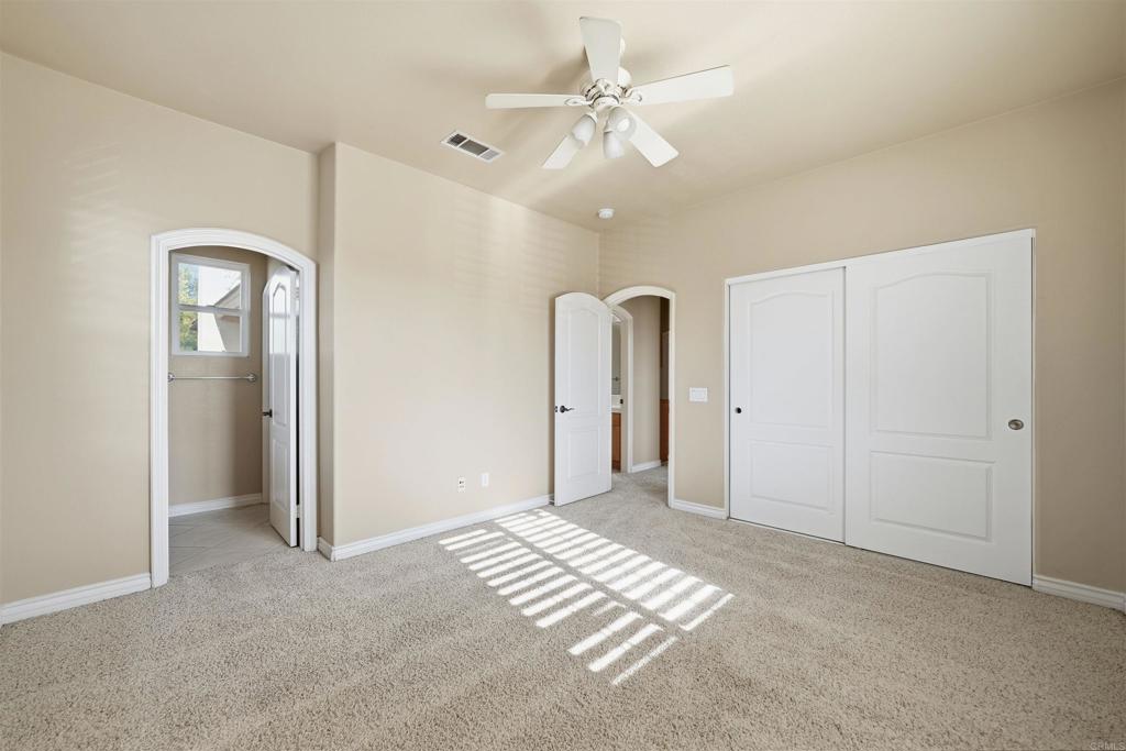 2612 Coyote Ridge Terrace Chula Vista, CA 91915 - Photo 37 of 57 wooden floor in an empty room with a window