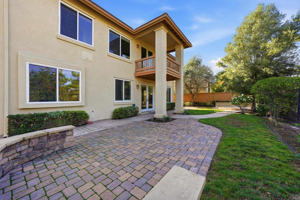 2612 Coyote Ridge Terrace Chula Vista, CA 91915 - Photo 52 of 57 a front view of a house with a yard