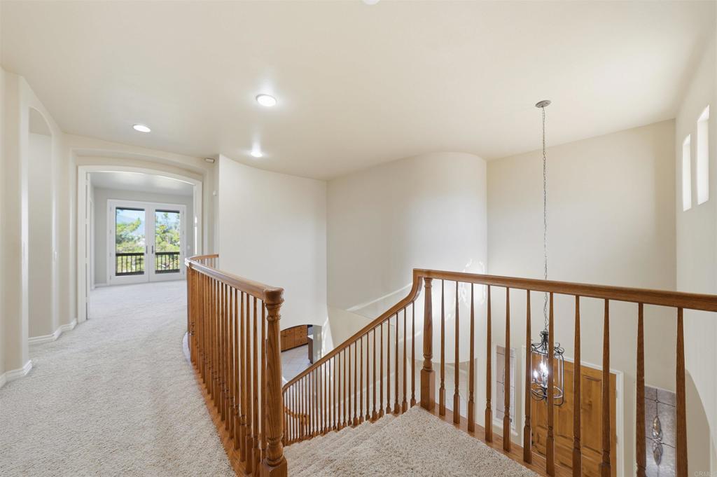 2612 Coyote Ridge Terrace Chula Vista, CA 91915 - Photo 10 of 57 a view of a hallway with windows
