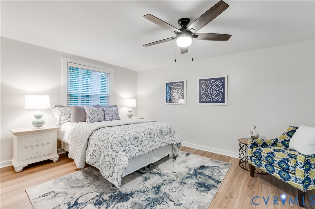 9324 Becar Road North Chesterfield, VA 23236 - Photo 22 of 33 Bright room featuring wood-finish flooring, a ceil