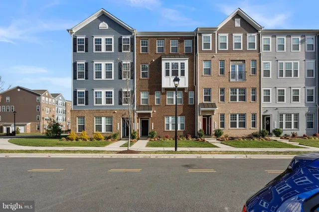 a front view of a building with street view