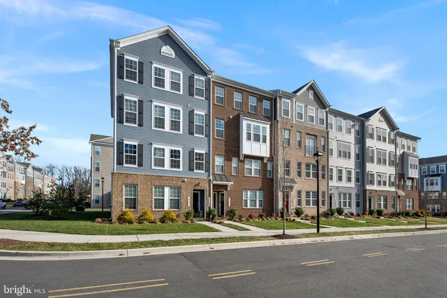 a front of a building with a yard