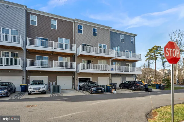 a backyard of a house with barbeque oven
