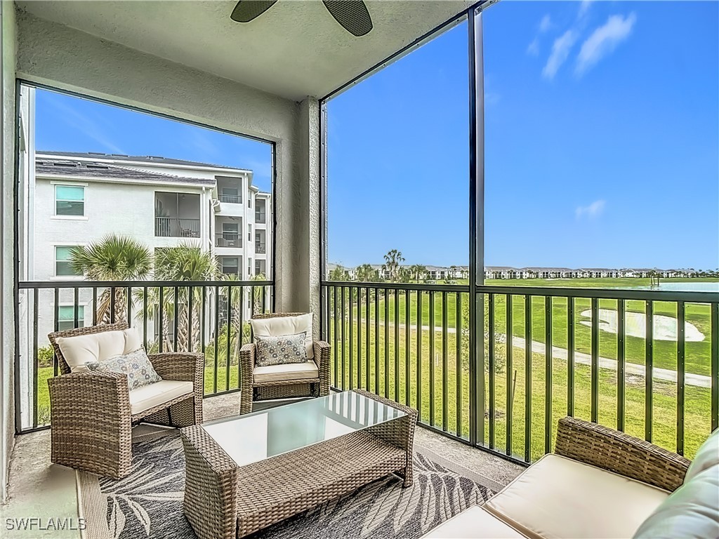 43981 Boardwalk Loop, Unit 2222 Punta Gorda, FL 33982 - Photo 31 of 50 a balcony with furniture