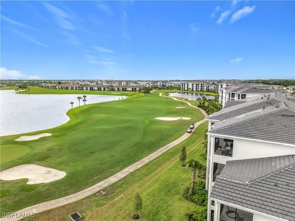 a view of a city with an ocean