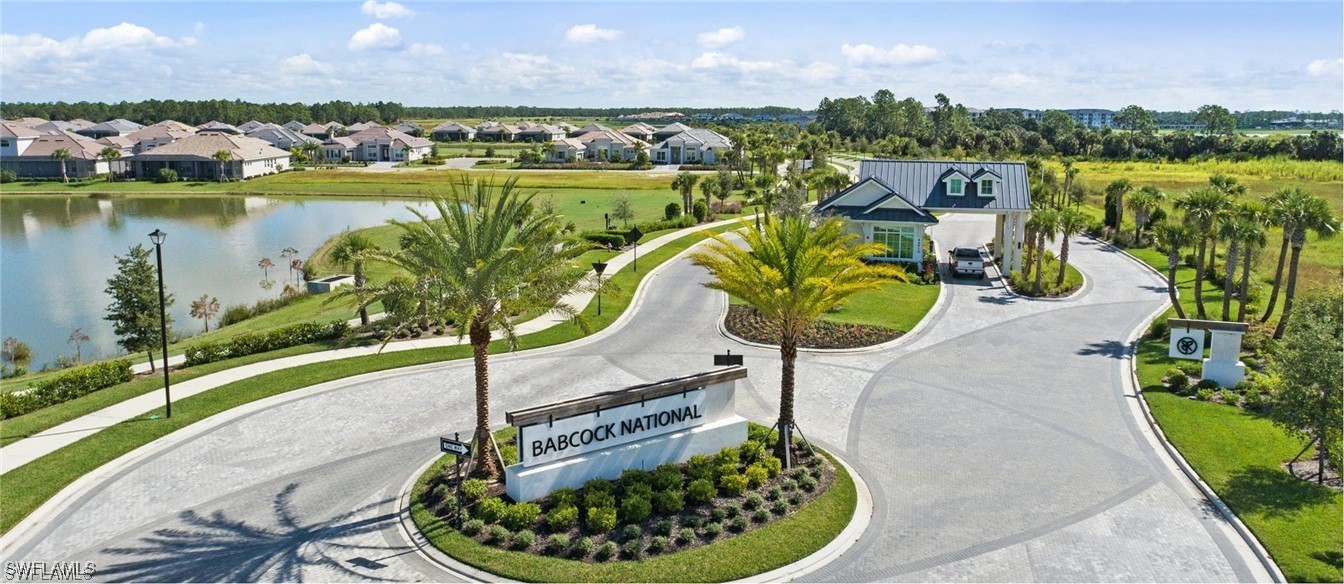 43981 Boardwalk Loop, Unit 2222 Punta Gorda, FL 33982 - Photo 49 of 50 a view of a swimming pool with a patio