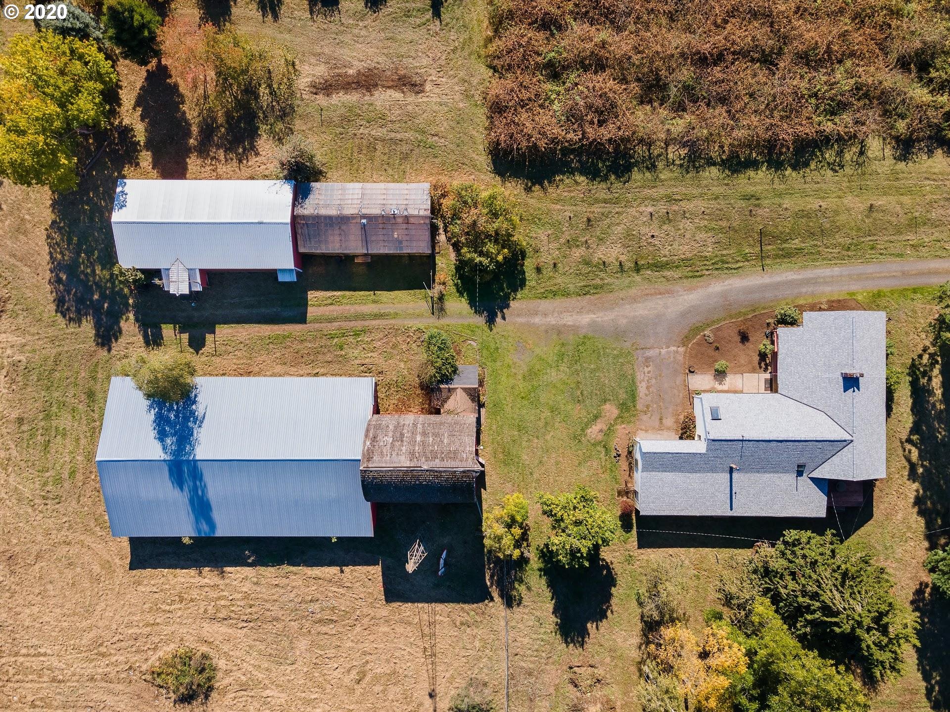 7110 Southwest Straughan Road Hillsboro, OR 97123 - Photo 17 of 28 an aerial view of a house with a yard