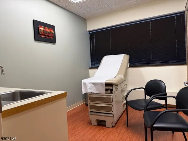 a view of workspace with wooden floor