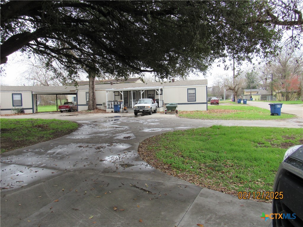 1650 Terminal Loop Road McQueeney, TX 78123 - Photo 4 of 5 a house view with a garden space