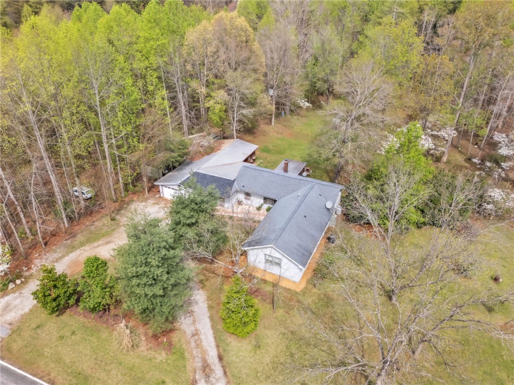 466 Whetstone Road Mountain Rest, SC 29664 - Photo 27 of 31 An aerial view showcases a residential property nestled amongst verdant trees.