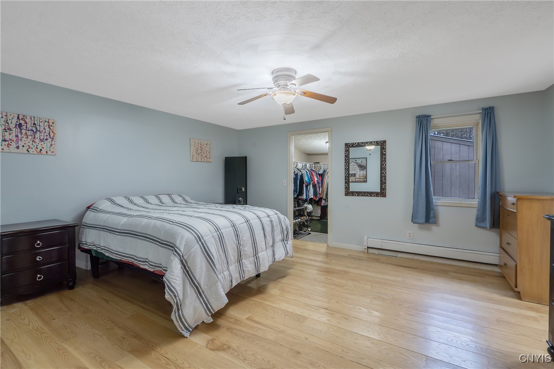 581 Cc Road Williamstown, NY 13302 - Photo 19 of 44 Owners' suite with walk-in closet & full bathroom.