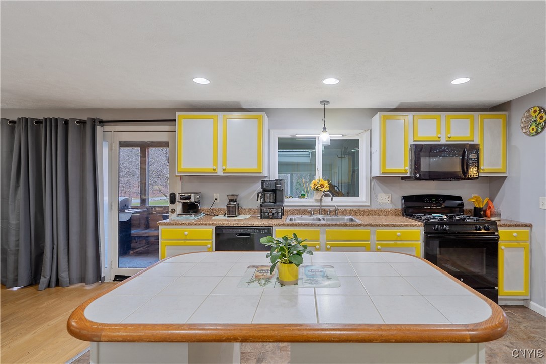 581 Cc Road Williamstown, NY 13302 - Photo 10 of 44 The kitchen island is equipped with two cabinets f