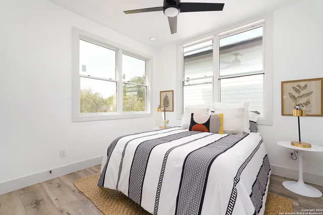 a bedroom with a bed and a dresser