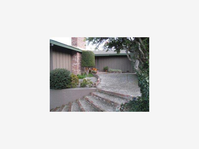 2955 Ribera Road Carmel, CA 93923 - Photo 4 of 9 a picture of a bench in middle of a house