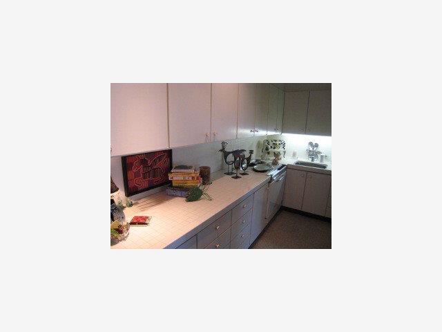 2955 Ribera Road Carmel, CA 93923 - Photo 9 of 9 a kitchen with a sink and a stove in it