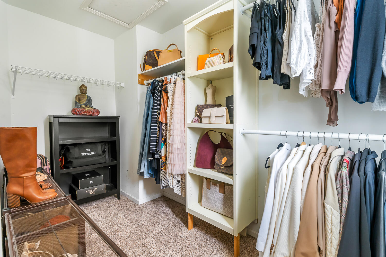 2725 West 127th Lane Crown Point, IN 46307 - Photo 25 of 51 a view of walk in closet with clothes and shoes
