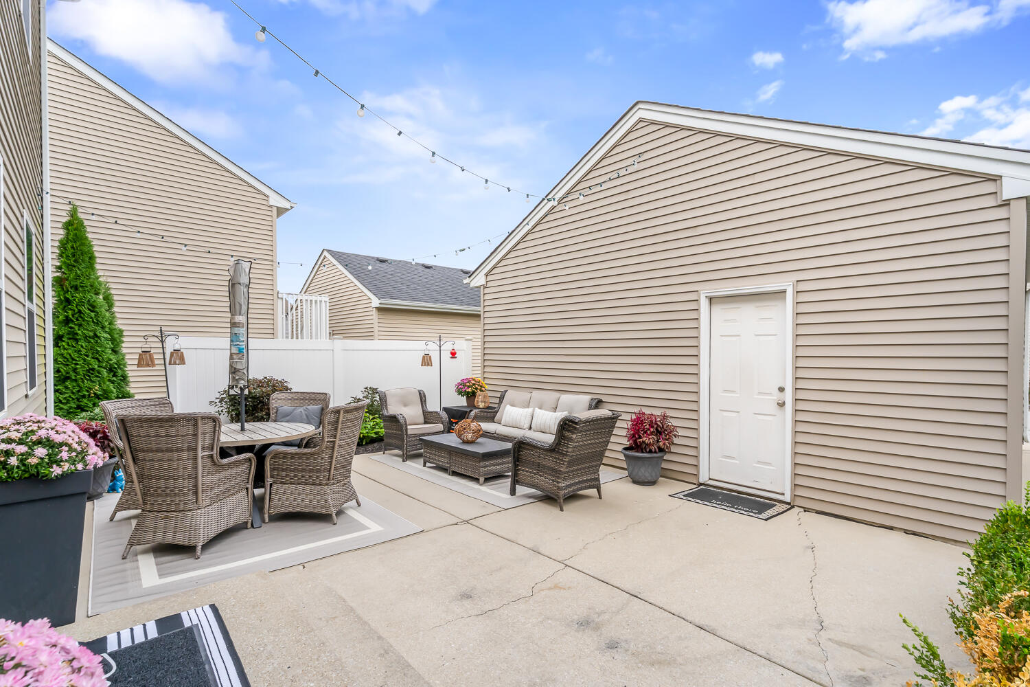 2725 West 127th Lane Crown Point, IN 46307 - Photo 49 of 51 a backyard of a house with outdoor seating