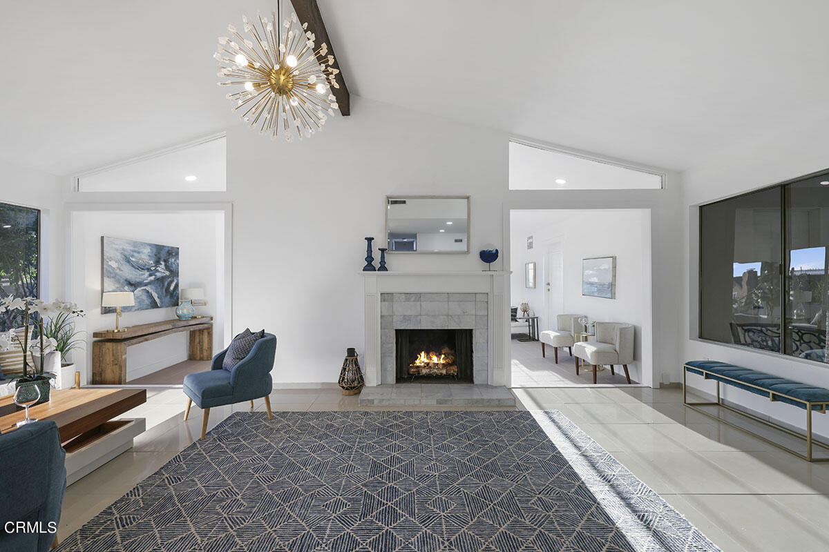10842 Owens Place Tujunga, CA 91042 - Photo 11 of 68 a living room with furniture and a fireplace