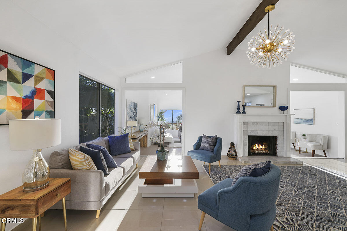 10842 Owens Place Tujunga, CA 91042 - Photo 12 of 68 a living room with furniture and a fireplace