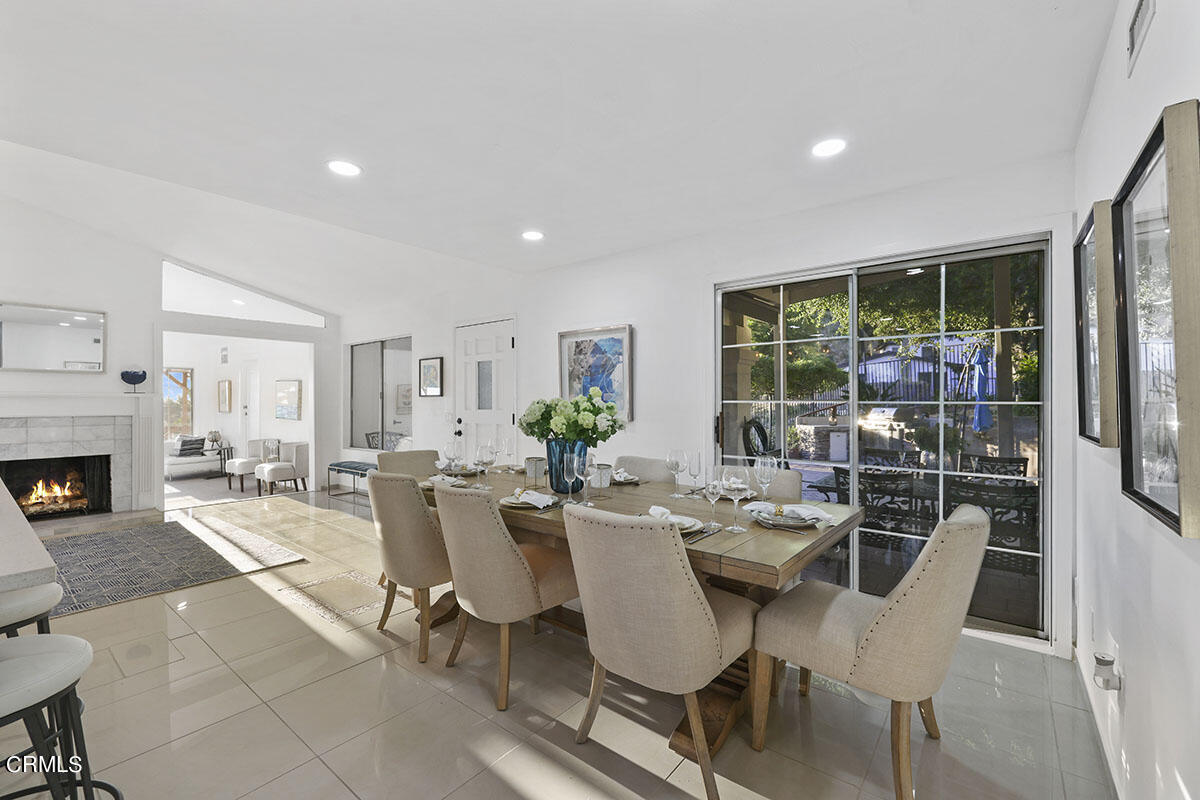 10842 Owens Place Tujunga, CA 91042 - Photo 20 of 68 a view of a dining room with furniture window and outside view