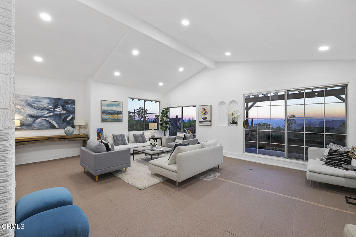 10842 Owens Place Tujunga, CA 91042 - Photo 21 of 68 a living room with furniture and a large window