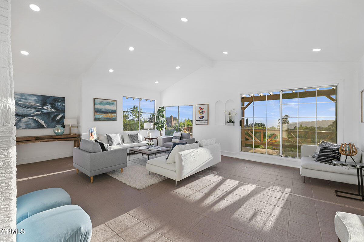 10842 Owens Place Tujunga, CA 91042 - Photo 24 of 68 a living room with furniture and a large window