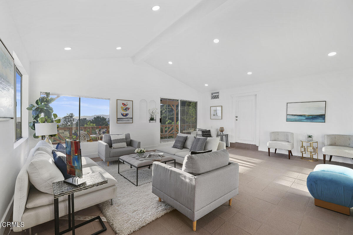 10842 Owens Place Tujunga, CA 91042 - Photo 26 of 68 a living room with furniture and a large window