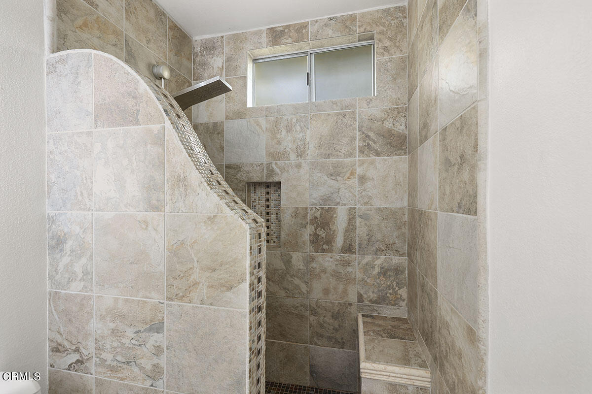10842 Owens Place Tujunga, CA 91042 - Photo 28 of 68 a bathroom with a shower