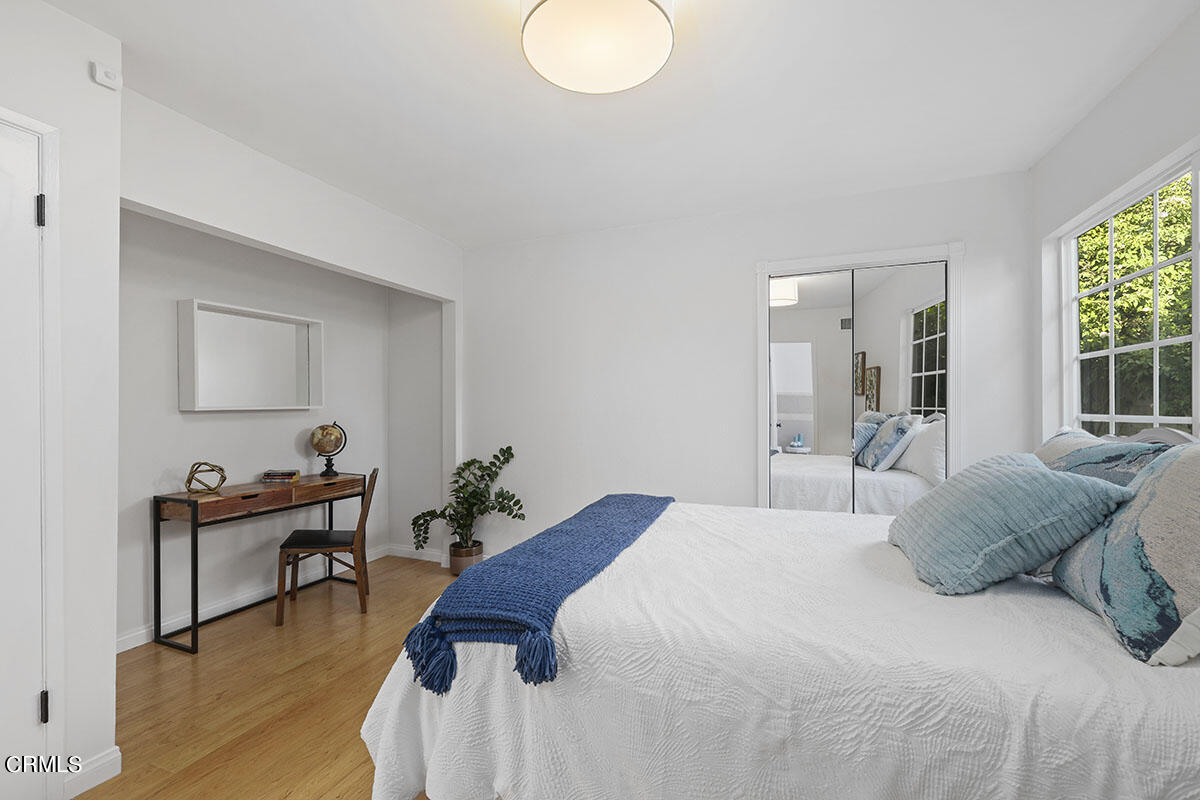 10842 Owens Place Tujunga, CA 91042 - Photo 33 of 68 a bedroom with a bed and a window