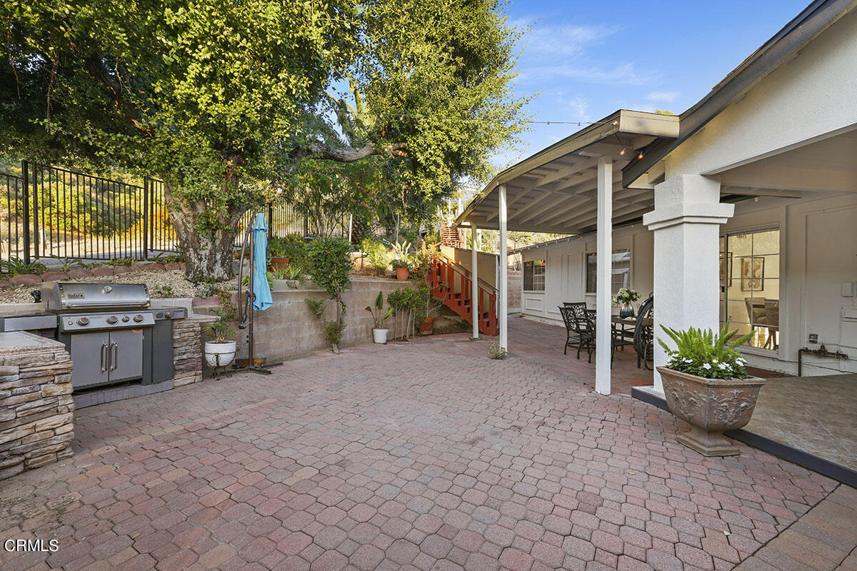 10842 Owens Place Tujunga, CA 91042 - Photo 46 of 68 a view of a house with backyard and sitting area