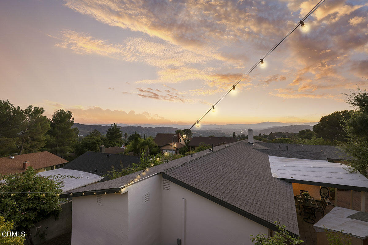 10842 Owens Place Tujunga, CA 91042 - Photo 53 of 68 a view of a terrace with a bench