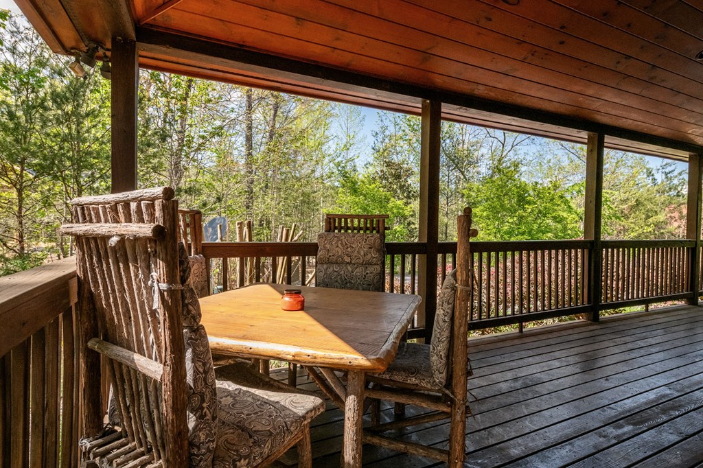 52 Whispering Lane Blue Ridge, GA 30513 - Photo 26 of 35 a view of a balcony with wooden floor