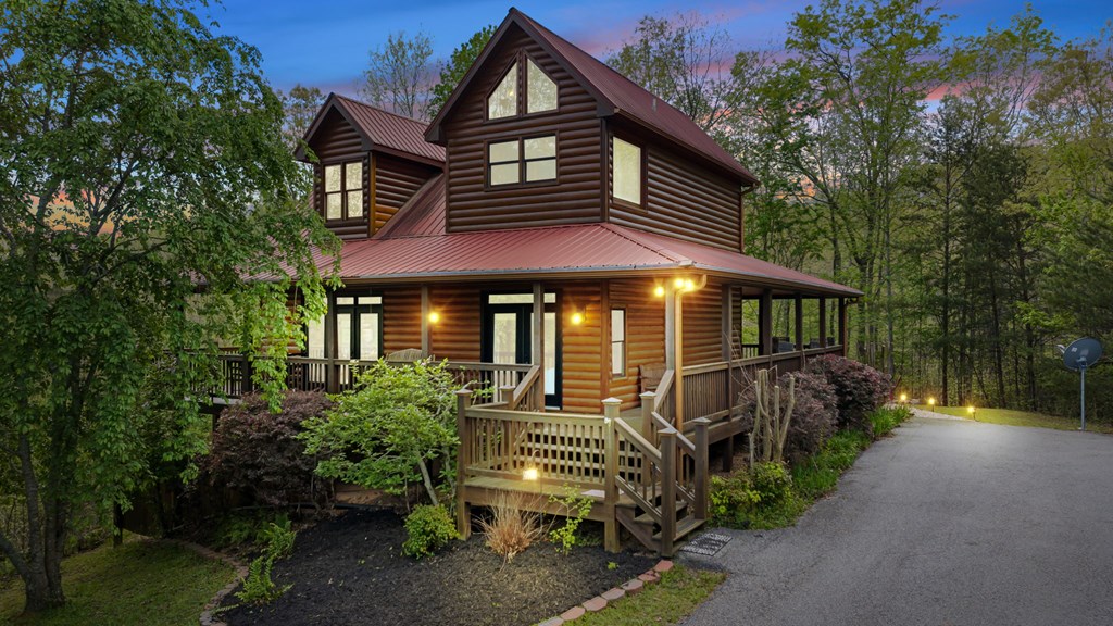 52 Whispering Lane Blue Ridge, GA 30513 - Photo 28 of 35 a front view of a house with a yard