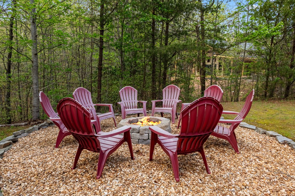 52 Whispering Lane Blue Ridge, GA 30513 - Photo 32 of 35 a view of a chairs in backyard of a house