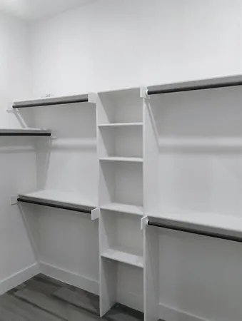 a view of an empty walk in closet