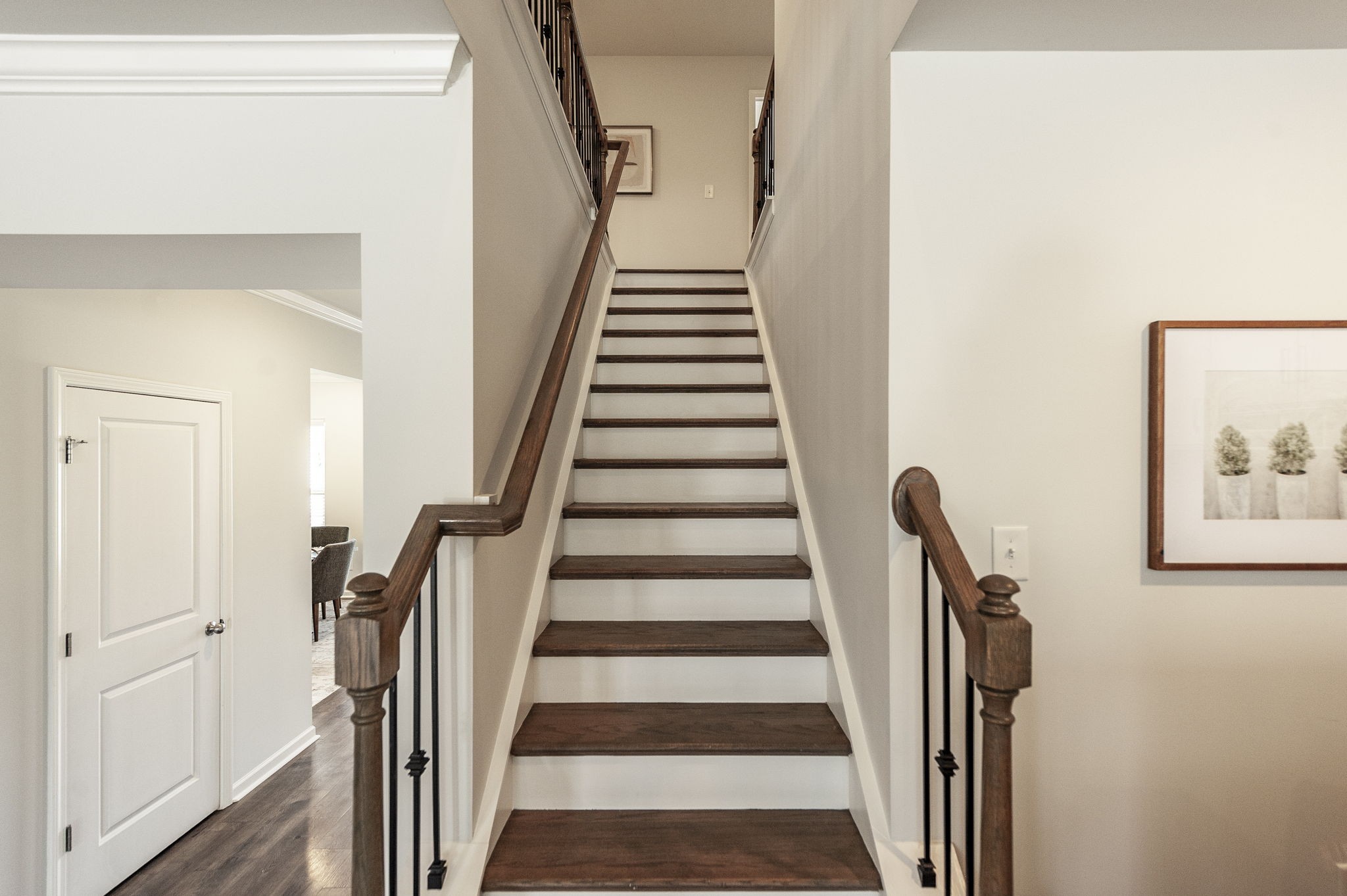1095 Brixworth Drive Spring Hill, TN 37174 - Photo 25 of 49 a view of a hallway with wooden floor and stairs
