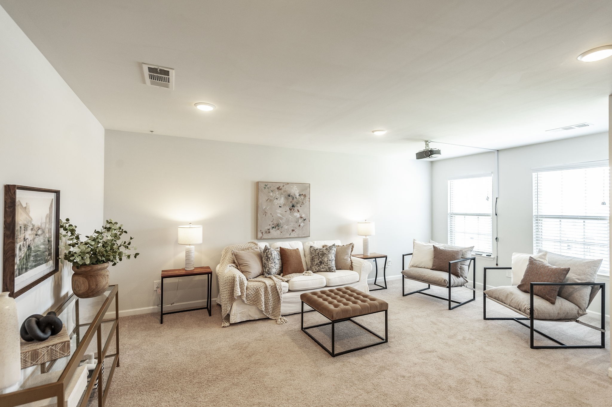 1095 Brixworth Drive Spring Hill, TN 37174 - Photo 26 of 49 a living room with furniture and a potted plant