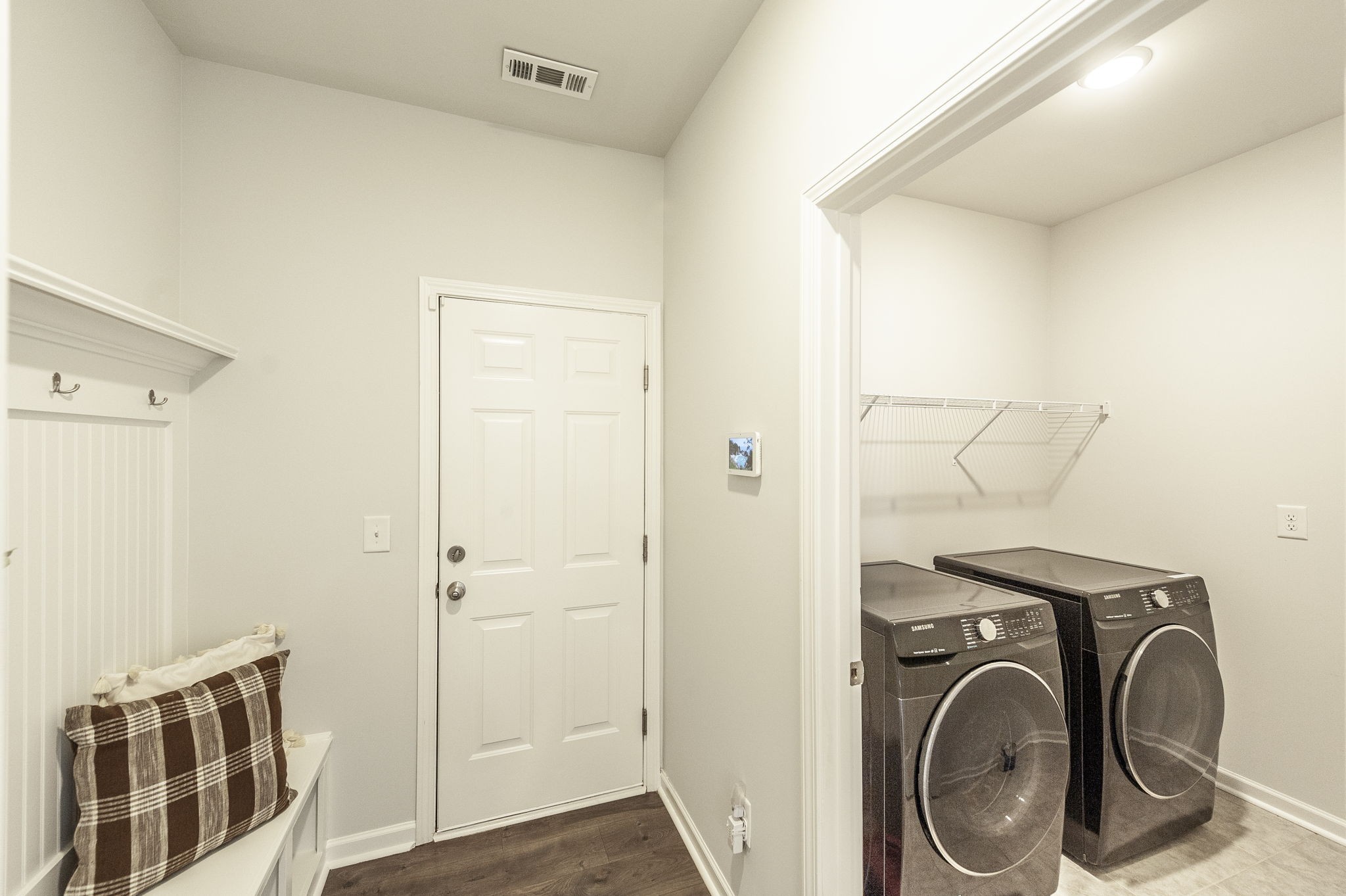 1095 Brixworth Drive Spring Hill, TN 37174 - Photo 36 of 49 a view of a storage & utility room with dryer and washer