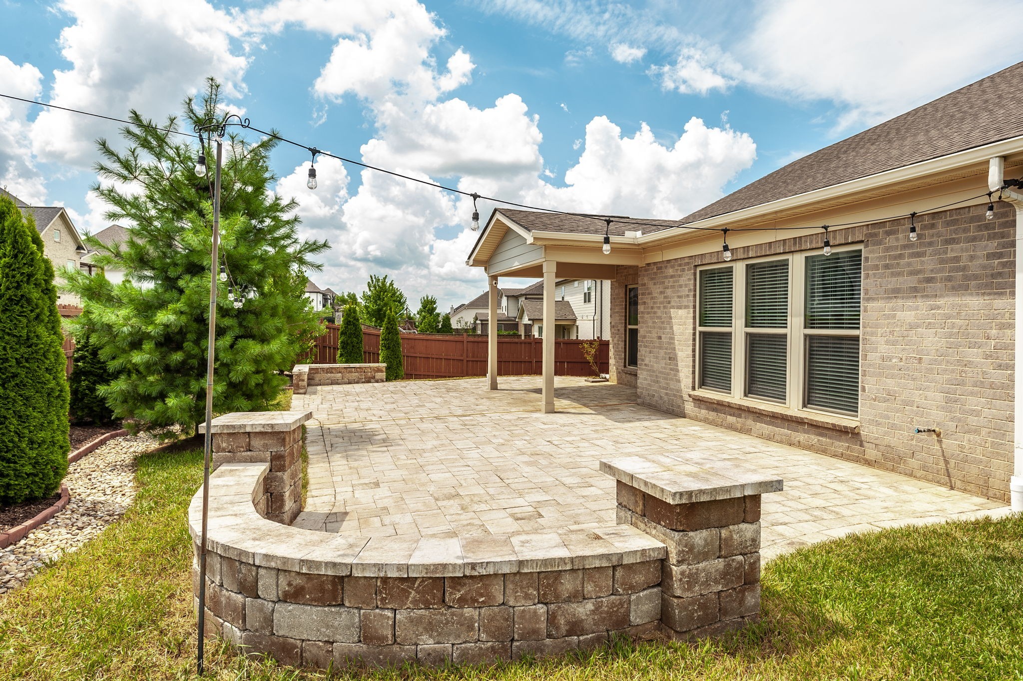 1095 Brixworth Drive Spring Hill, TN 37174 - Photo 37 of 49 a view of a house with backyard and sitting area