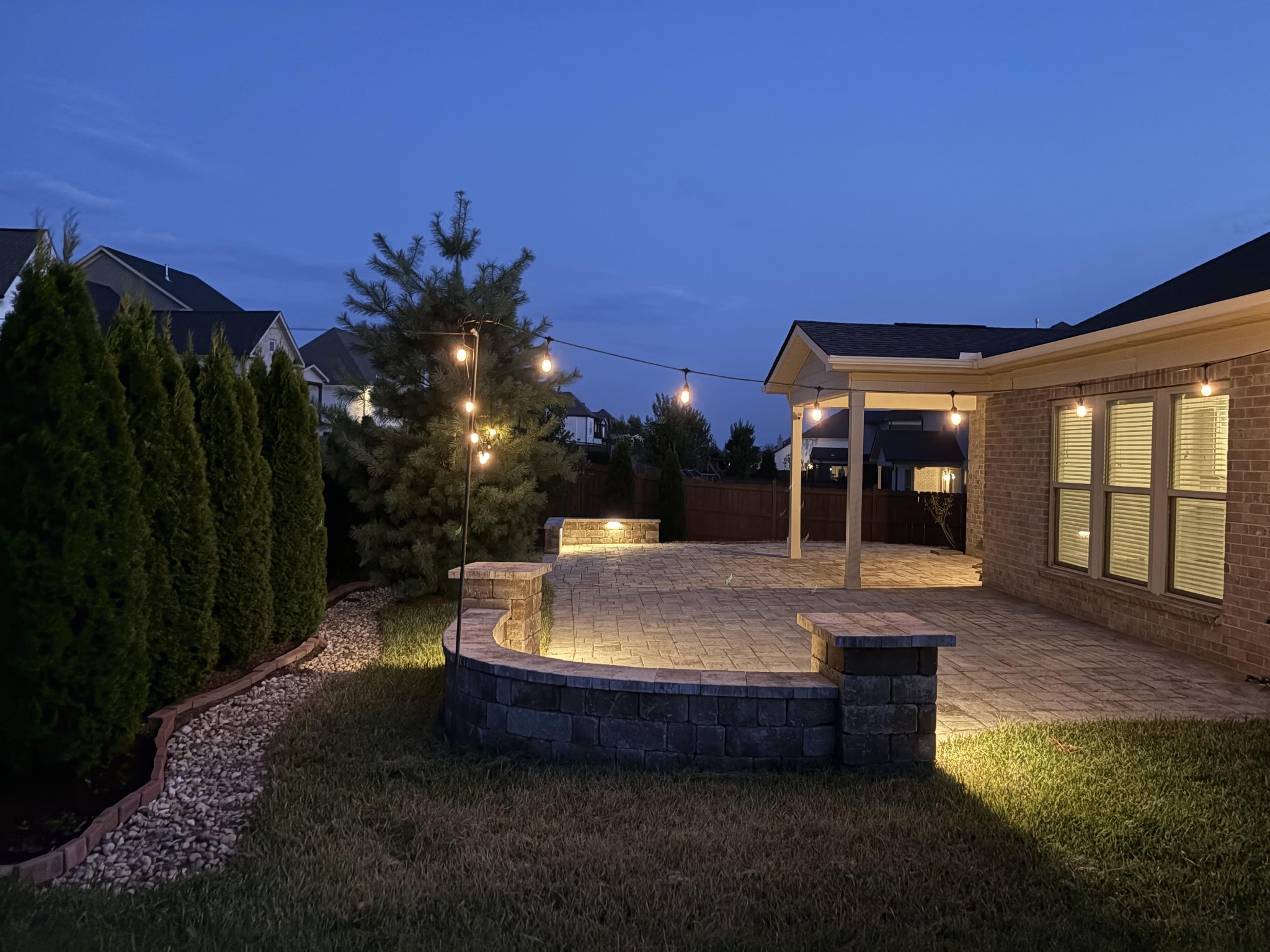 1095 Brixworth Drive Spring Hill, TN 37174 - Photo 42 of 49 a view of patio with dining table and chairs with wooden fence