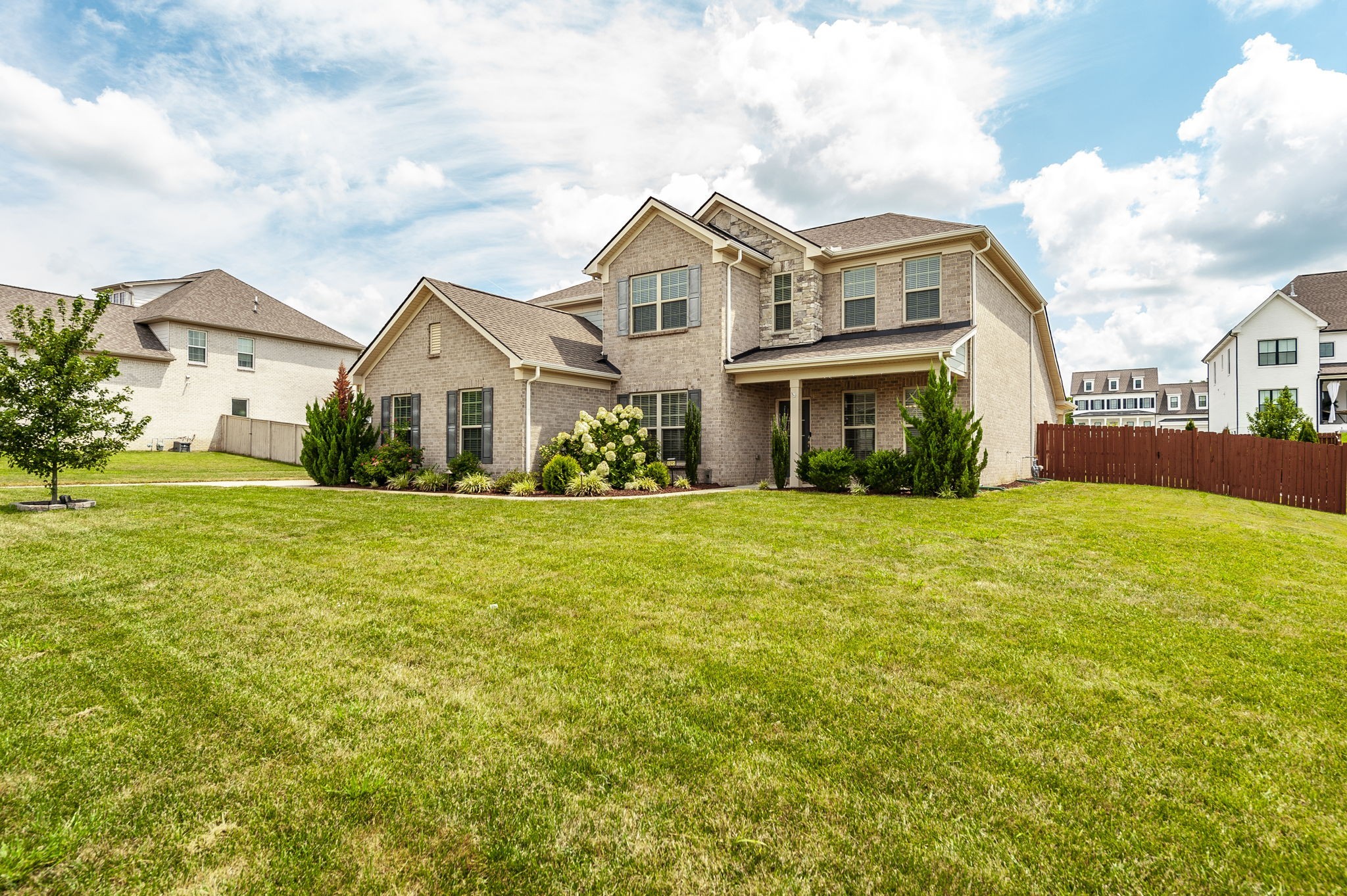 1095 Brixworth Drive Spring Hill, TN 37174 - Photo 45 of 49 a front view of a house with a yard
