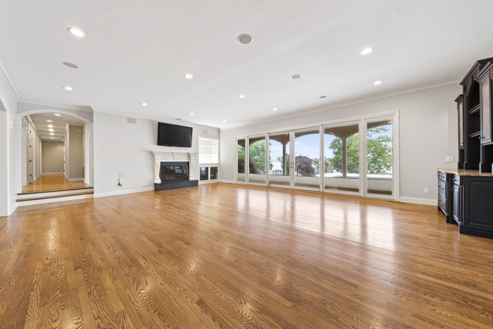 101 Kennett Road Old Hickory, TN 37138 - Photo 49 of 100 a view of empty room with wooden floor and fireplace